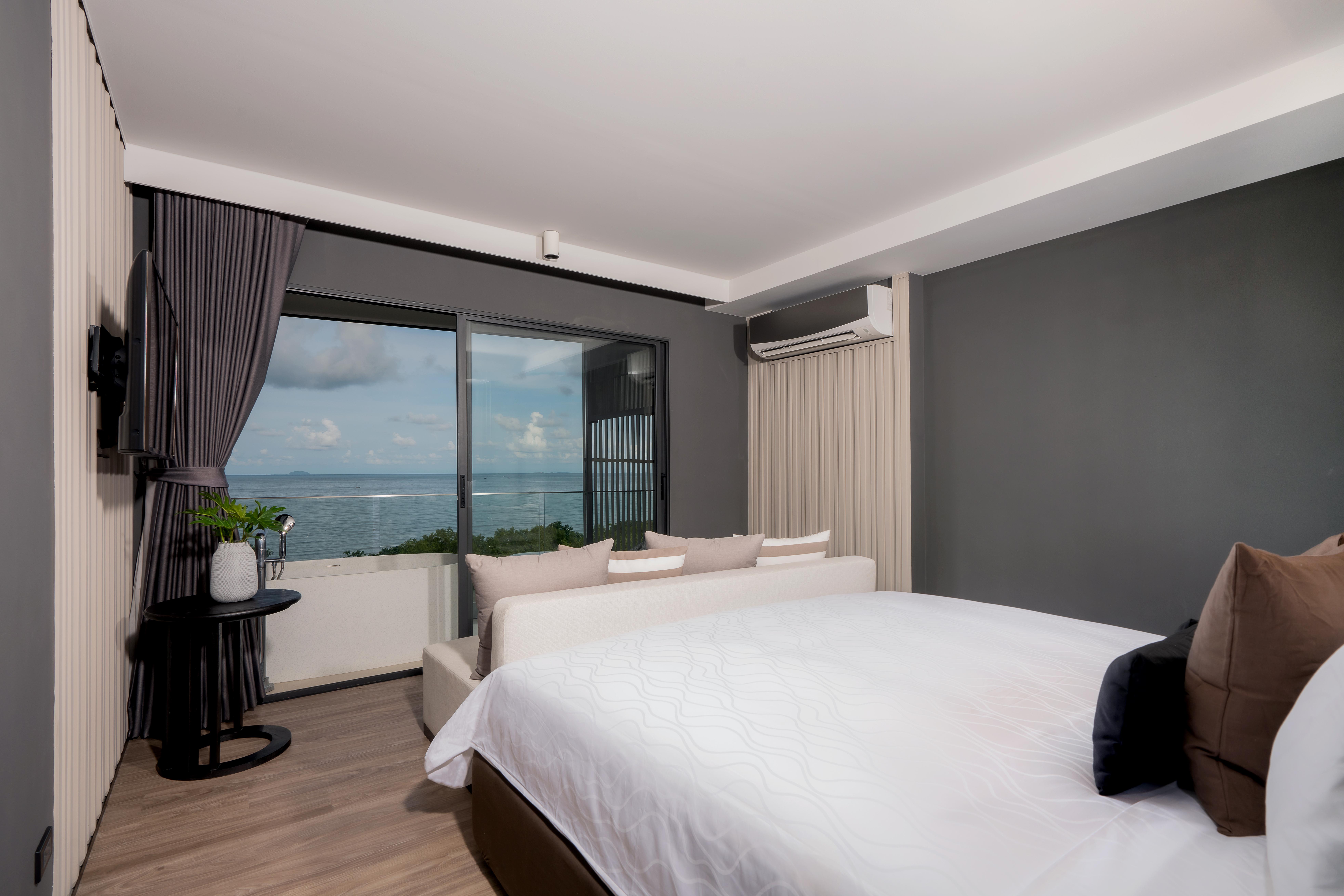 Bayphere Hotel Pattaya Jc Na Chom Thian Buitenkant foto A bedroom in a hotel